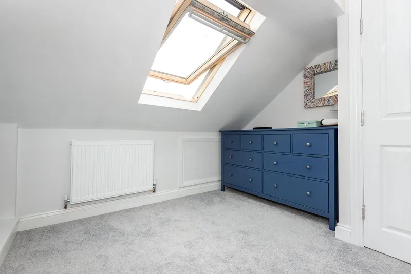 A loft conversion fitted with an additional radiator for warmth