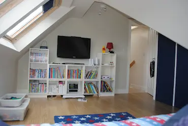 Child play area with tv and bookshelf
